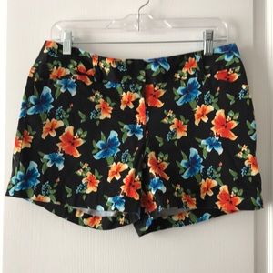 WHBM black shorts with red and blue flowers
